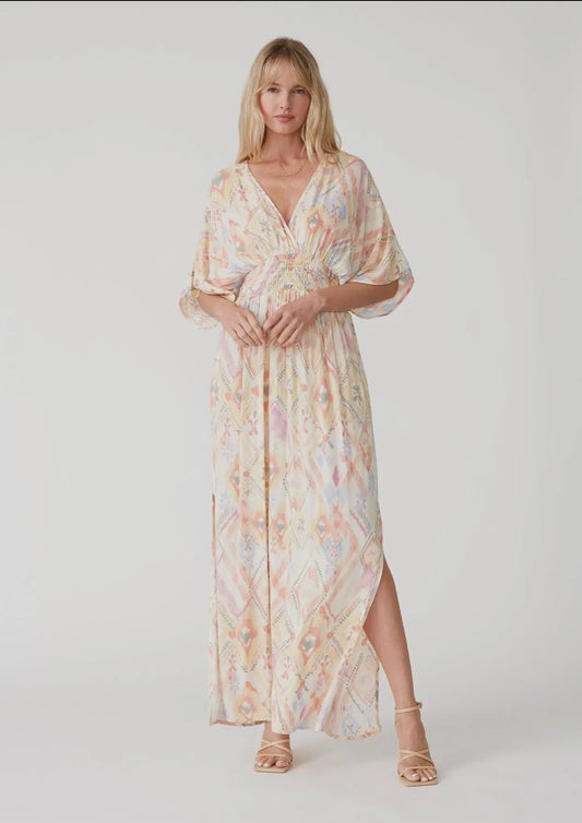 Pastel colored maxi dress with a bat wing sleeve