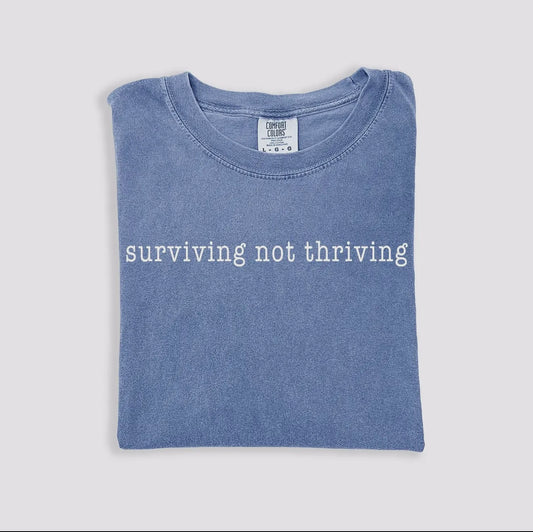 Surviving, not thriving tee
