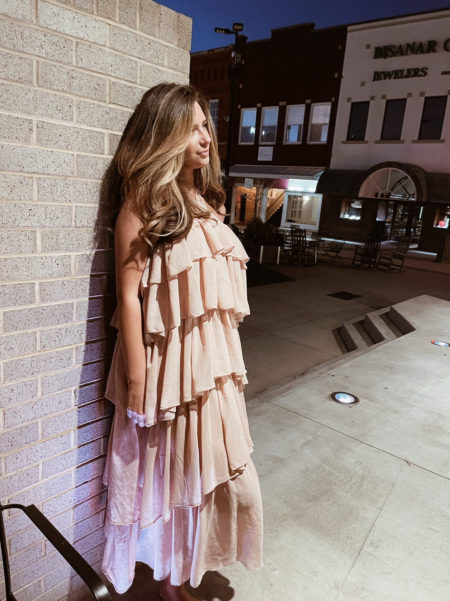 Neutral pink toned tiered ruffle maxi dress with a halter neck